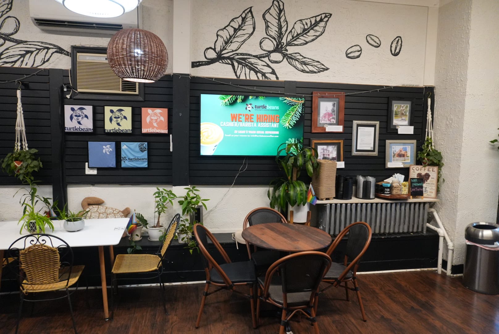 Turtle Beans Coffee cafe interior seating area with digital menu